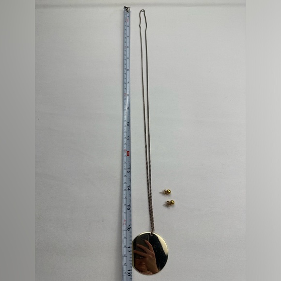 Faux gold large circle pendant long necklace and gold stud earrings. - Picture 2 of 4